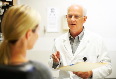 getty rf photo of doctor talking to woman