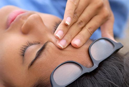 getty rf photo of woman with headache