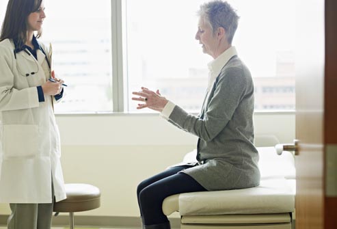 getty rm photo of woman talking to doctor