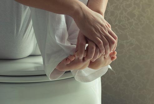 getty rm photo of woman touching toes